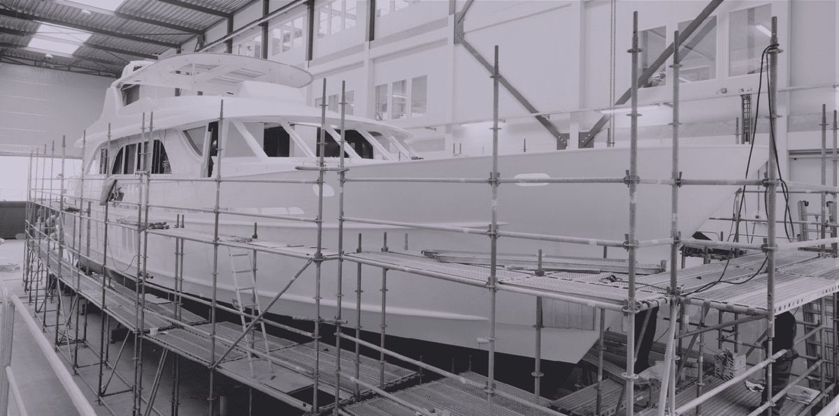 Superyacht under refit with scaffolding in a Spanish yard under the Inward Processing TPA regime