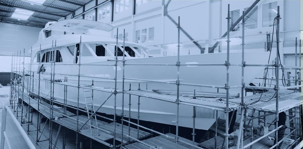Superyacht in refit inside a covered shed in Spain